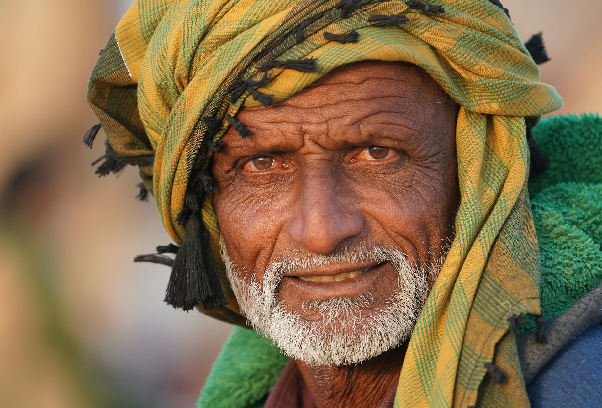a man with a beard and a hat